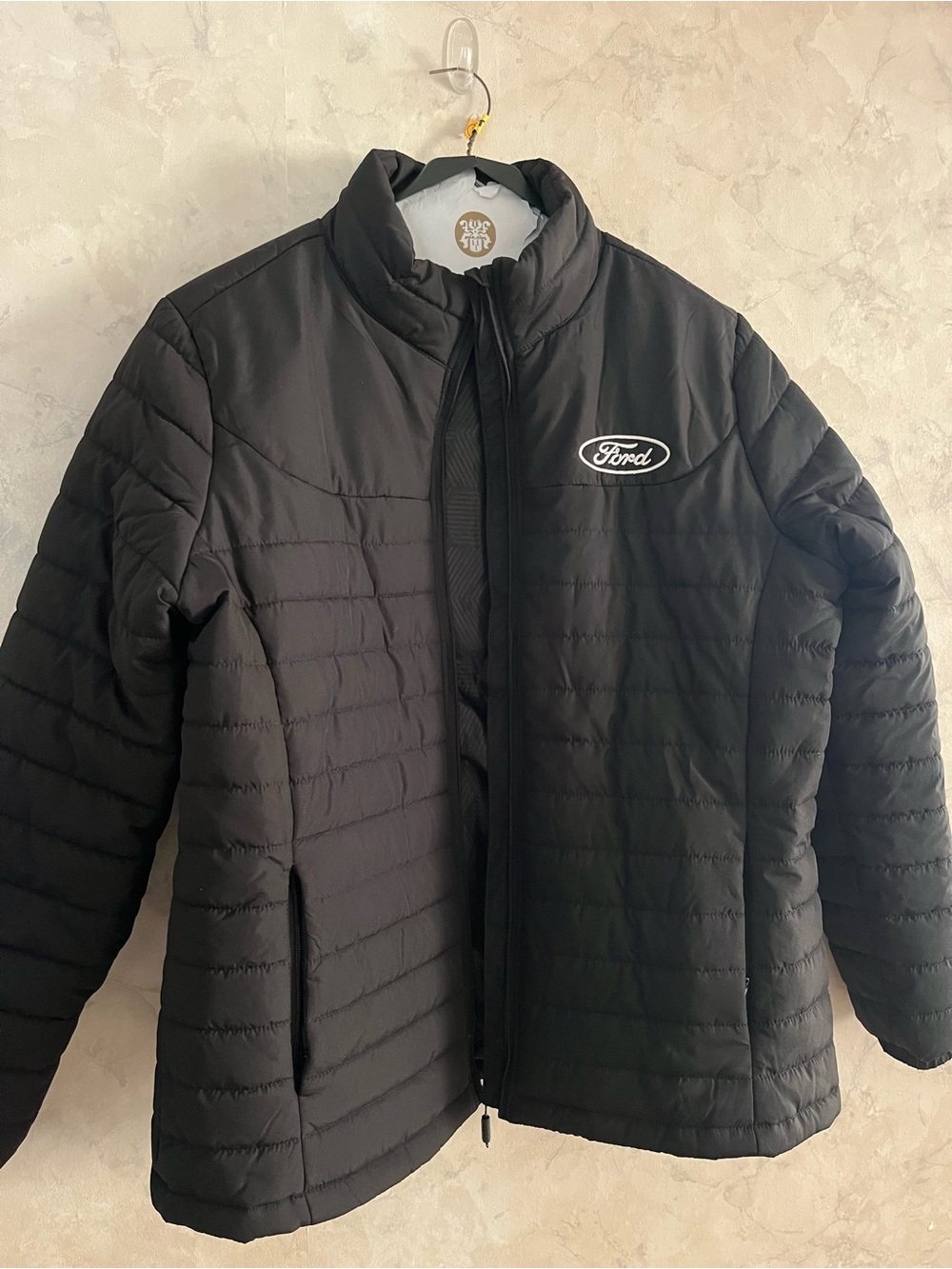 Stormtech Ladies Black Quilted Puffer Jacket with Ford Logo